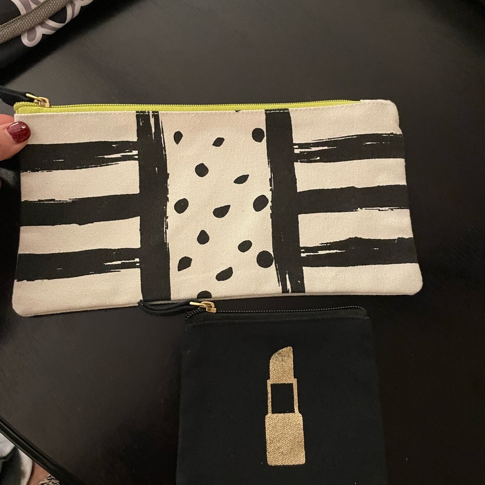 Mud pie. Two never used bags for make up or whatever